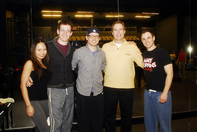 Point Park President Paul Hennigan visits with Point Park alumni who returned to campus to conduct a master class. From left to right: