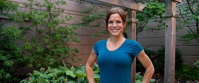 Pictured is Melissa Bender, psychology alumna, occupational therapist, yoga instructor and fitness blogger. | Photo by Chris Rolinson