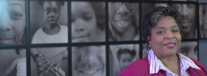 Pictured is M.A. in organizational leadership alumna Jenniffer Burke.