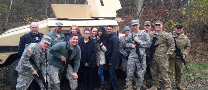 Pictured are Point Park criminal justice and intelligence and national security majors with soldiers of the 303rd Psychological Operations Unit of the U.S. Army Reserves. | Photo by Captain Michael Schwille