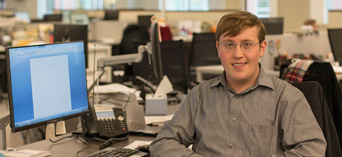 Pictured is School of Communication alumnus Andrew Goldstein at the Pittsburgh Post-Gazette. Photo | Victoria A. Mikula