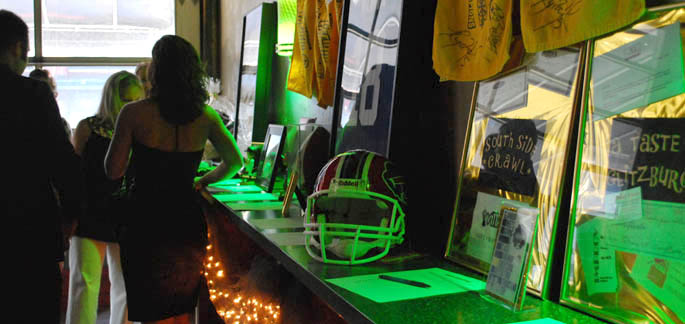 The Glitzburgh fundraiser offered a variety of sports-related items for the silent auction. | Photo by Stephanie Jackson