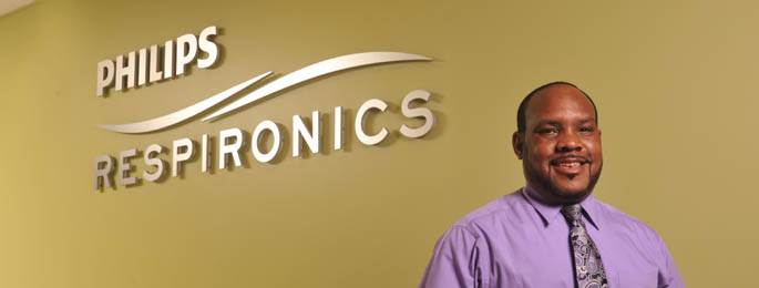 Pictured is M.B.A. alum John Gobble, engineer for Philips Respironics. 