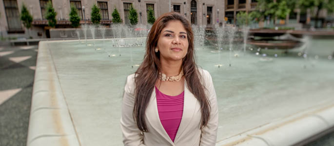 Pictured is Neha Goel, a 2010 Point Park M.B.A. alumna and business analyst for UPMC Health Plan. | Photo by Chris Rolinson
