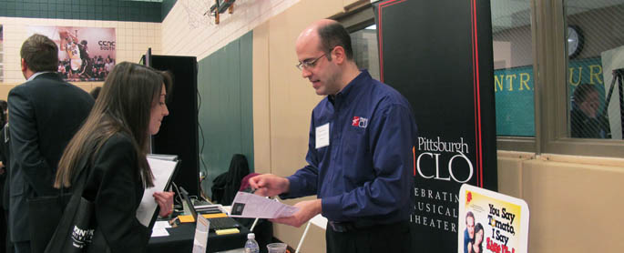 Pictured is Michael Cerchiaro, education programs manager for the Pittsburgh CLO, with a Point Park student.