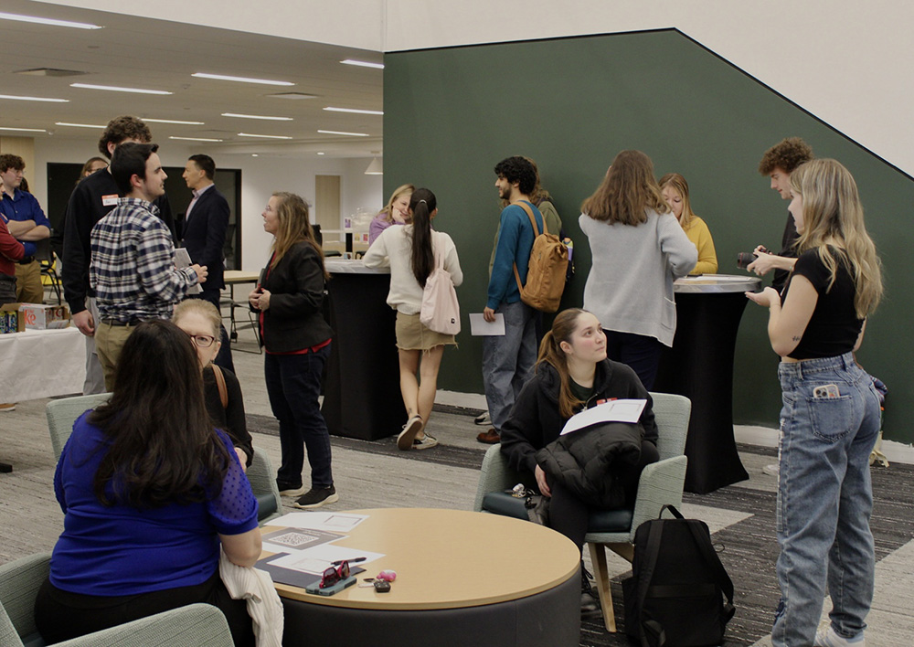 Pictured are students at a networking event in the Professional Career-Readiness Center. Photo by Kellie Strate.