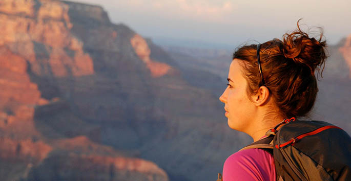 Senior photography major Madeline McKain looks out on the vast stretches of the Grand Canyon during a semester of study there. | Photo courtesy of Madeline McKain