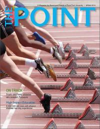 A screen shot of the cover of the spring 2014 issue of The Point, showing several athletic shoes lined up at starting blocks on a track, representing the start of track and field teams at Point Park University.