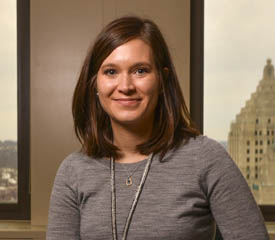 Pictured is Elizabeth Andreakos, 2013 business alumna and assistant facility manager for CBRE. | Photo by Jim Judkis