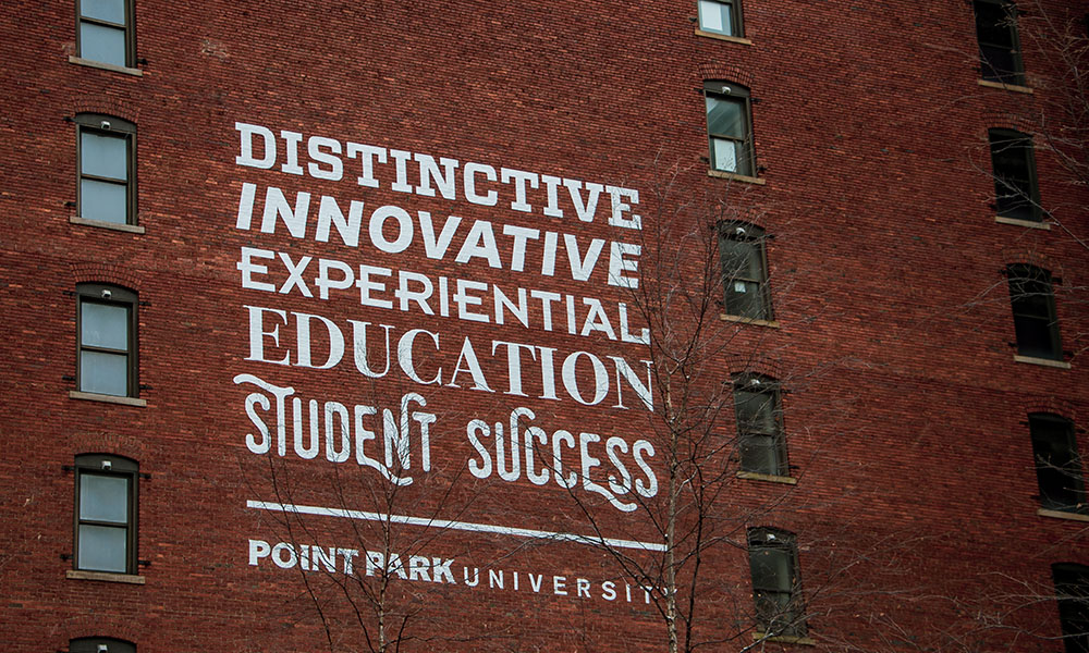Pictured is a building mural at Point Park University. Photo by Megan Gloeckler.