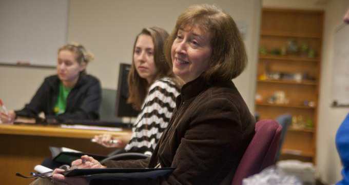 Honors Program Director Helen Fallon with students