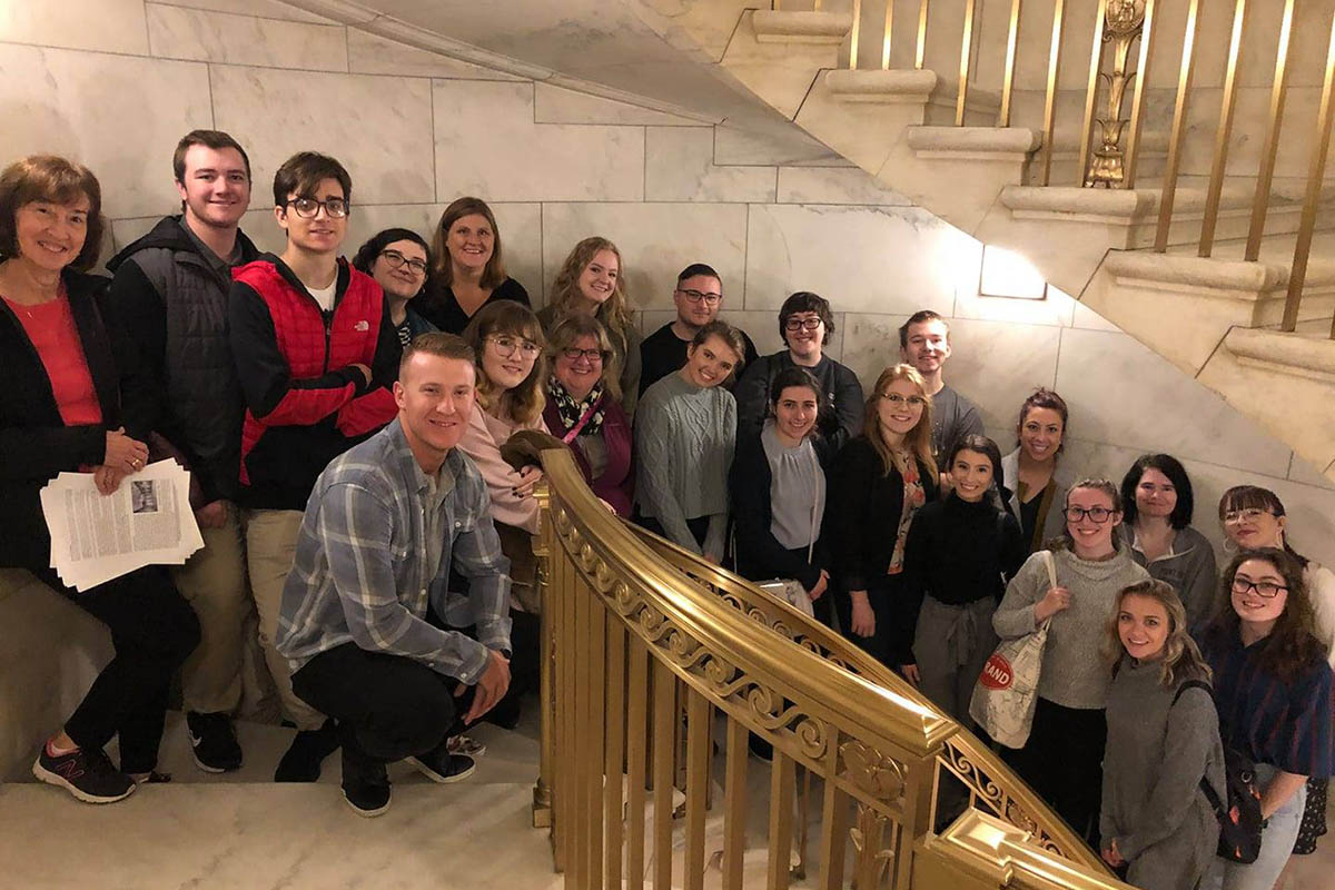 Honors students in the U.S. Supreme Court building at the end of a tour led by honors alumnus Thaddeus Covaleski.