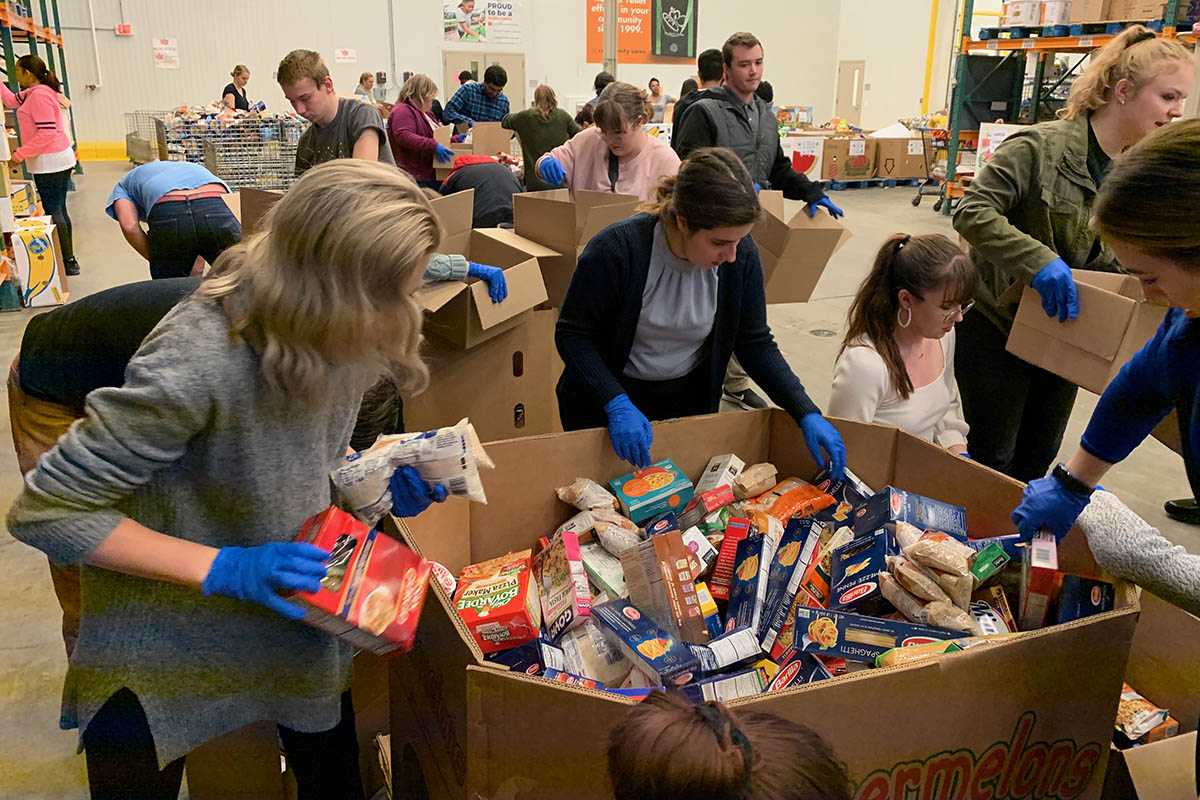 Students volunteer at the Capital Area Food Bank. 