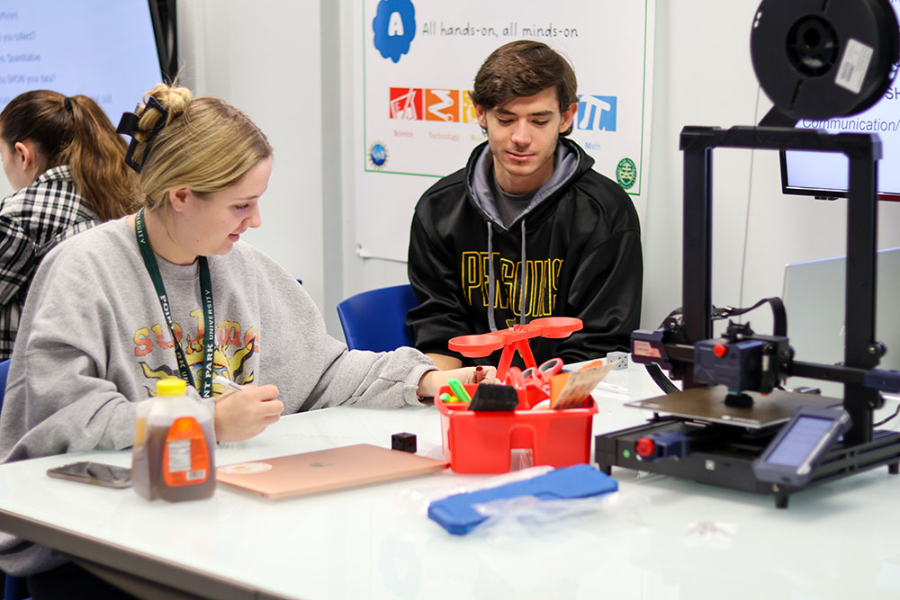 Pictured are two students working together in Matt's Maker Space Lab. Photo by Natalie Caine.