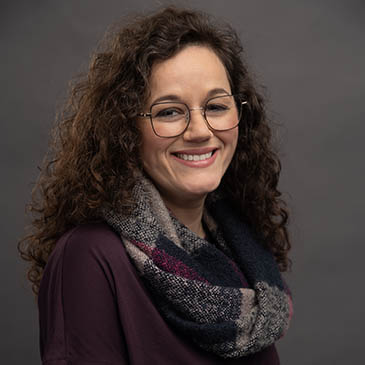 Pictured is April Friges, associate professor of photography.