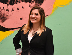 Pictured is SAEM alumna and M.B.A. student Lena Tavoletti, administrative and financial coordinator for The Andy Warhol Museum. | Photo by Brandy Richey