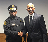 Pictured is Eric Holmes with President Barack Obama. Photo submitted by Holmes.