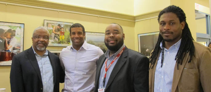 Pictured is Point Park education professor Stanley Denton, Ed.D. (far left) with representatives of the Black Male Teaching Initiative program. | Photo by Amanda Dabbs