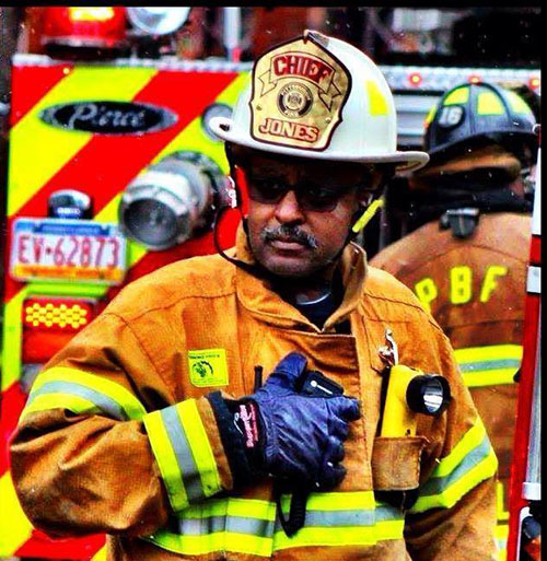 Pictured is Pittsburgh Fire Chief Darryl Jones, Ph.D., in firefighter gear. Photo submitted by Jones.