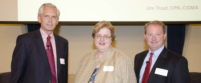 Pictured left to right are James E. Traut, Karen McIntyre and Brian Shuttleworth.