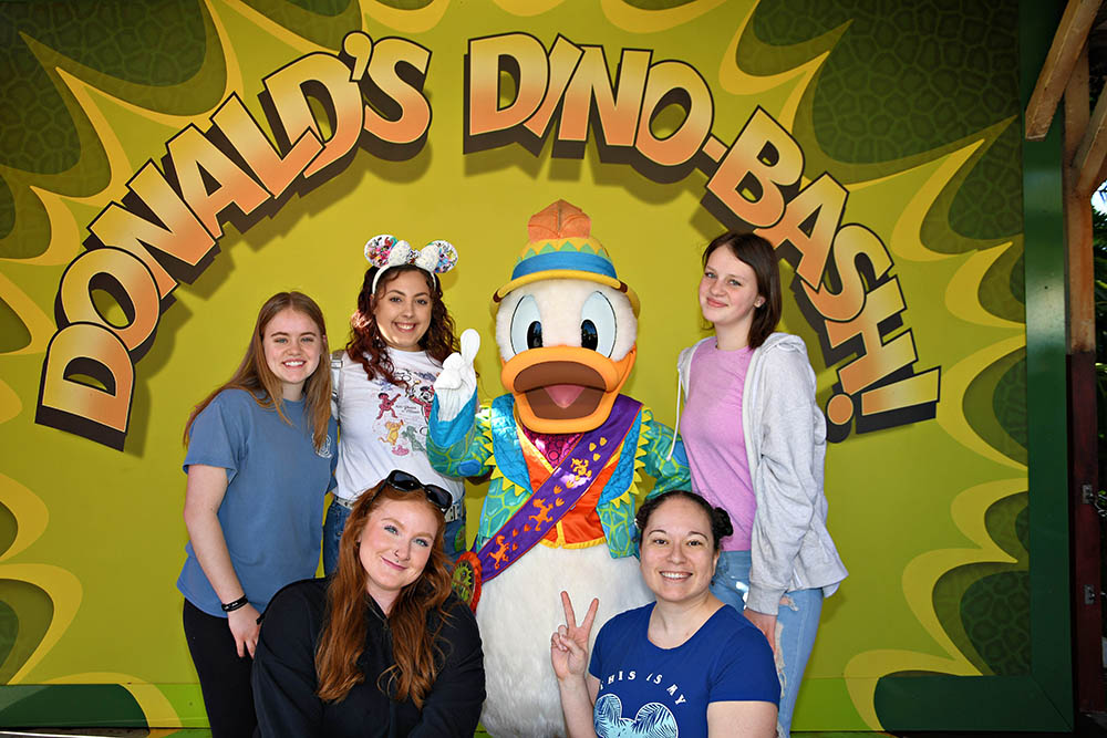 Pictured are students with Donald Duck at the Animal Kingdom. Submitted photo.