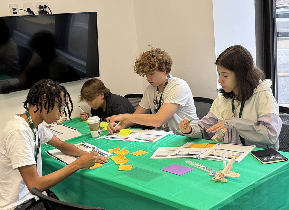 Pictured are students working on an activity at Point SPARK: Entrepreneurship camp. Photo by Dorene Ciletti. 