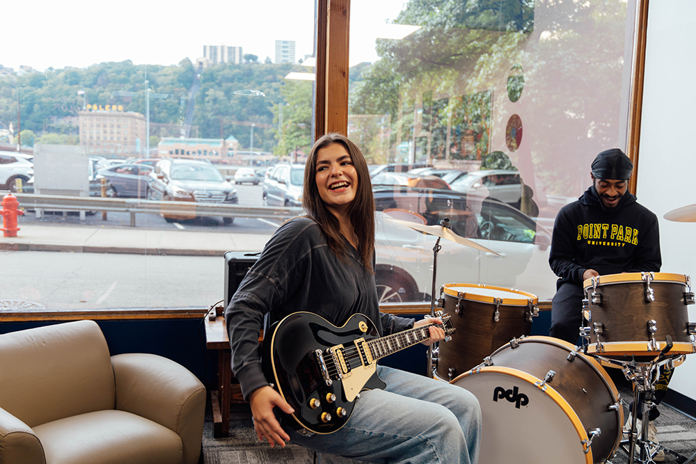 Pictured is Lydia Zarefoss and Terry Craig Jr. in The Sound Vault. Photo by Ethan Stoner.