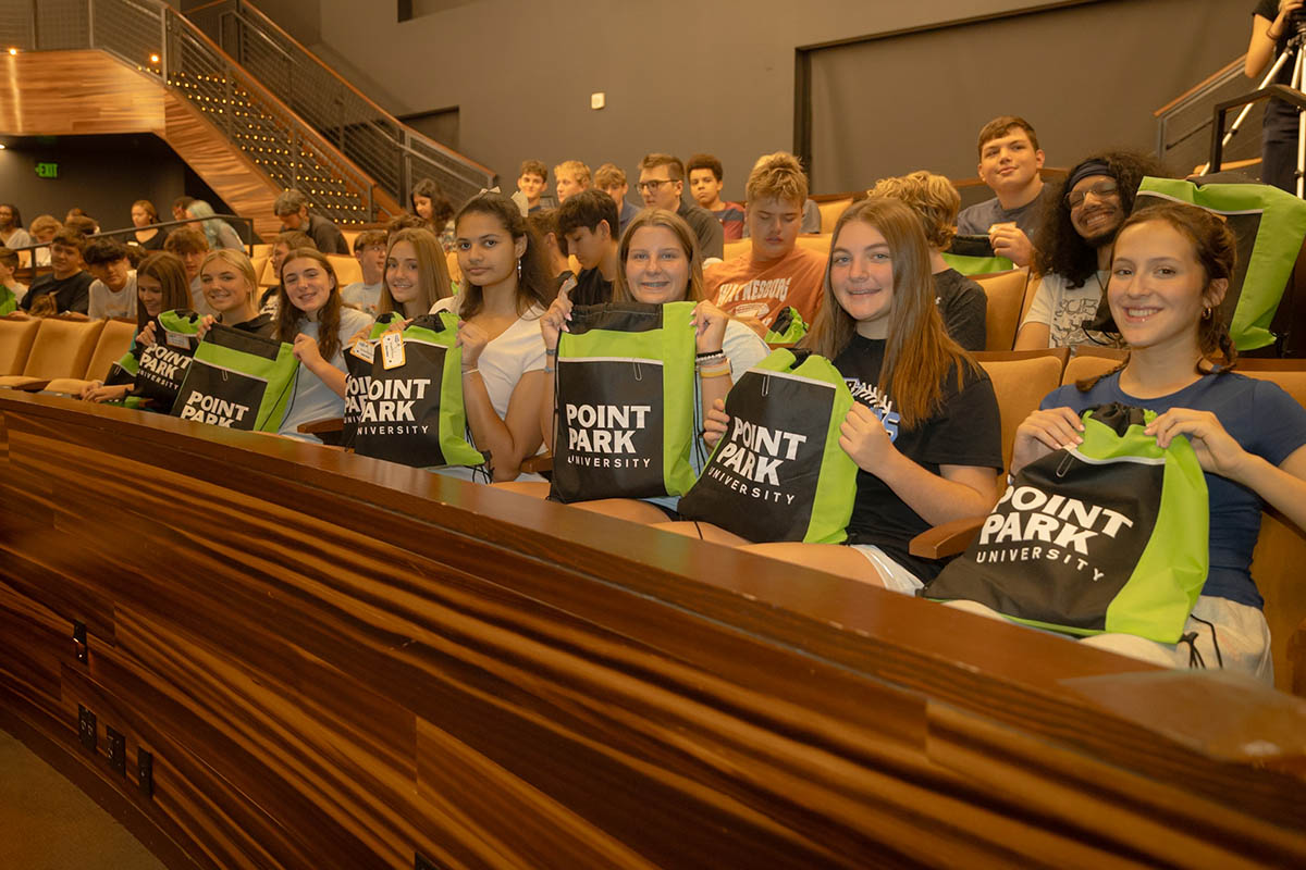 High school students with Newsapalooza bags. 