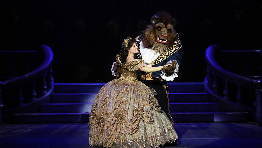 Kristin Serafini as Belle dancing with the Beast in Disney Dreams on Disney Cruise Line.