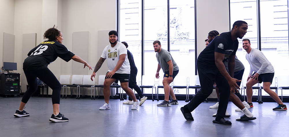 The Pittsburgh Steelers rookie class with Point Park theatre faculty in the University's Pittsburgh Playhouse. 