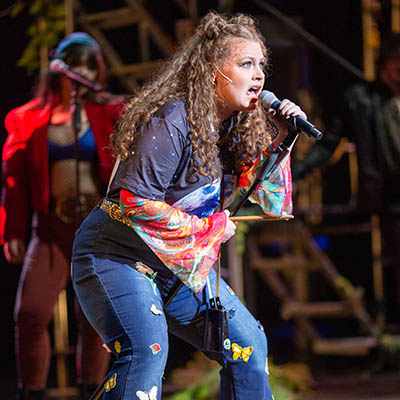 Pictured is Cammi Caldwell in RENT at Point Park University's Pittsburgh Playhouse.