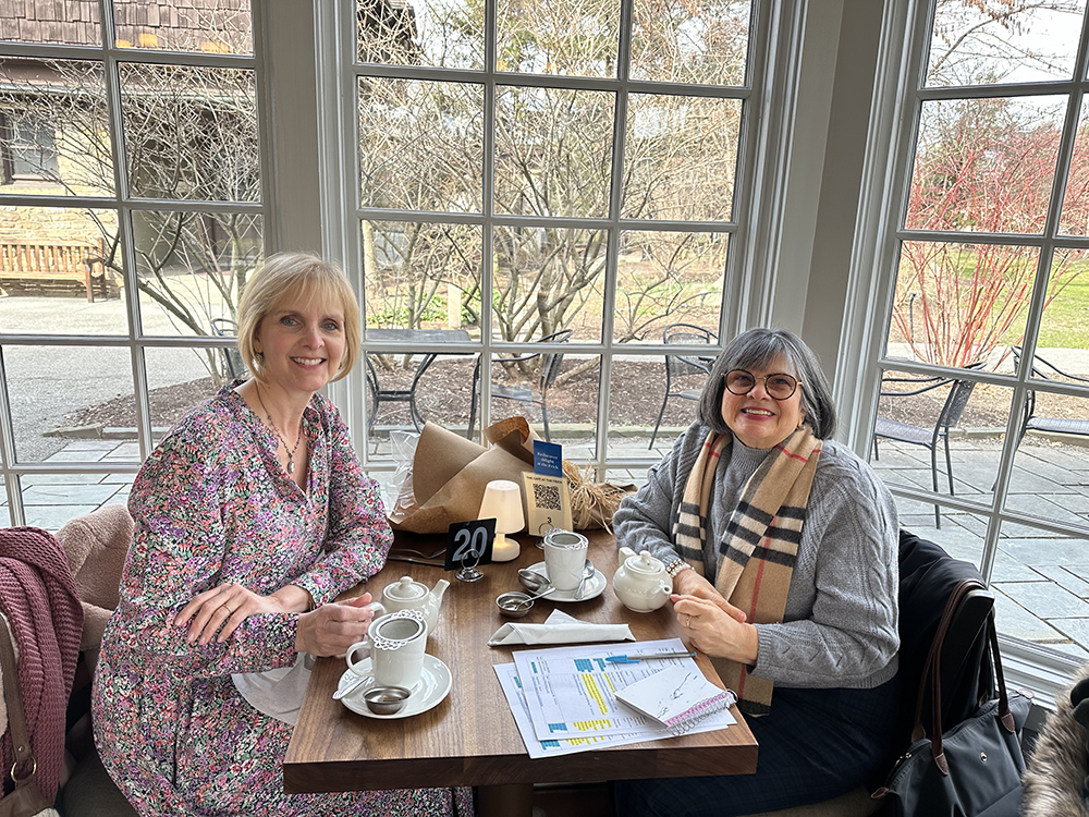 Pictured are Christal Edmunds and Vincenne Revilla Beltrán sharing tea at The Frick. Submitted photo.