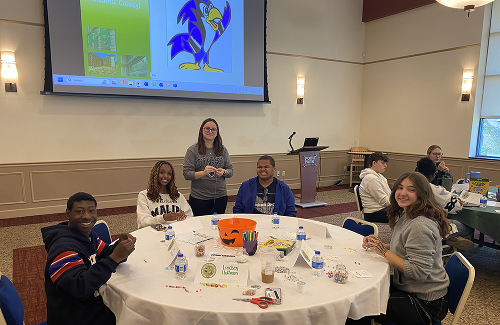 Pictured is Lindsey Hoffman with high school students during a Destination Special Education event. Photo by Nicole Chynoweth.