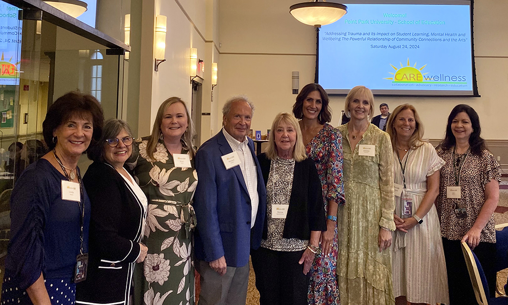 Pictured from left to right are School of Education faculty members Linda Hippert, Vincenne Revilla Beltrán, Shari Payne, Richard Gutkind, Denise Beverina-Moore, Kamryn York, Christal Edmunds, Marybeth Irvin and Lori Sutton at the school's first C.A.R.E. Symposium.