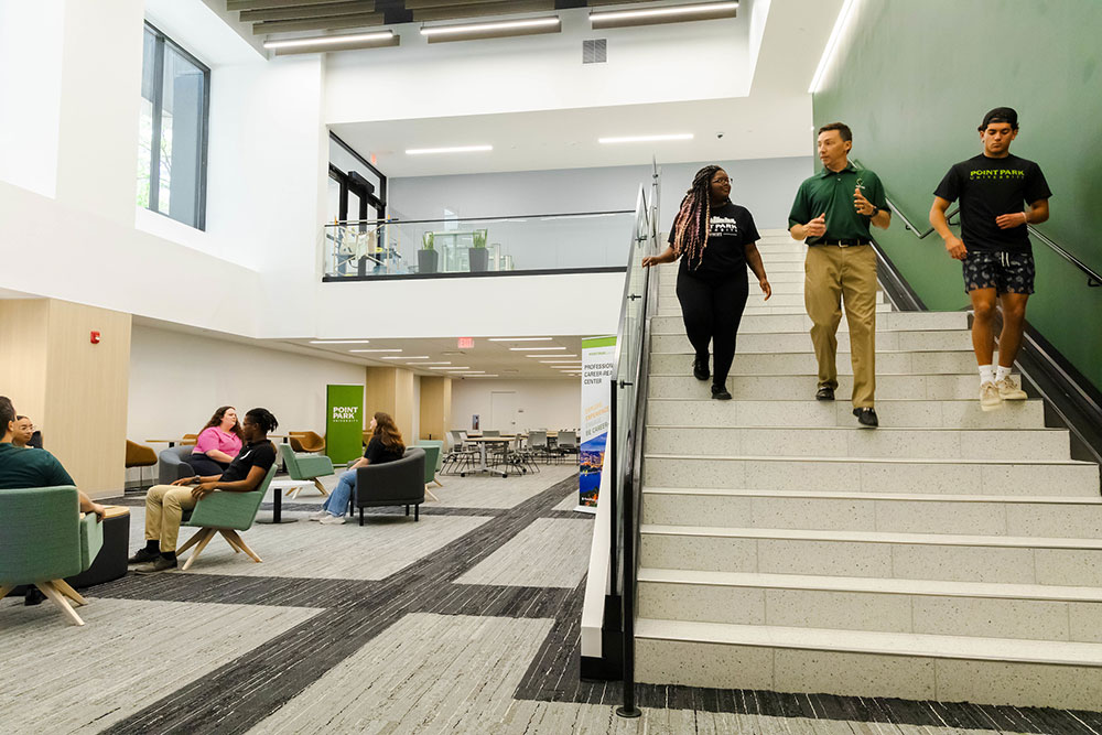 People walk and sit in the new Professional Career-Readiness Center.