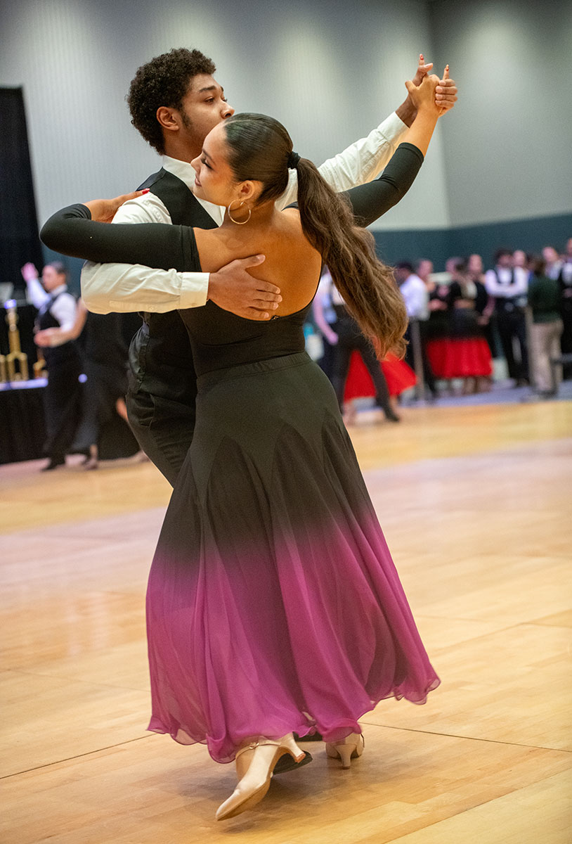 Two ballroom dance students compete. 