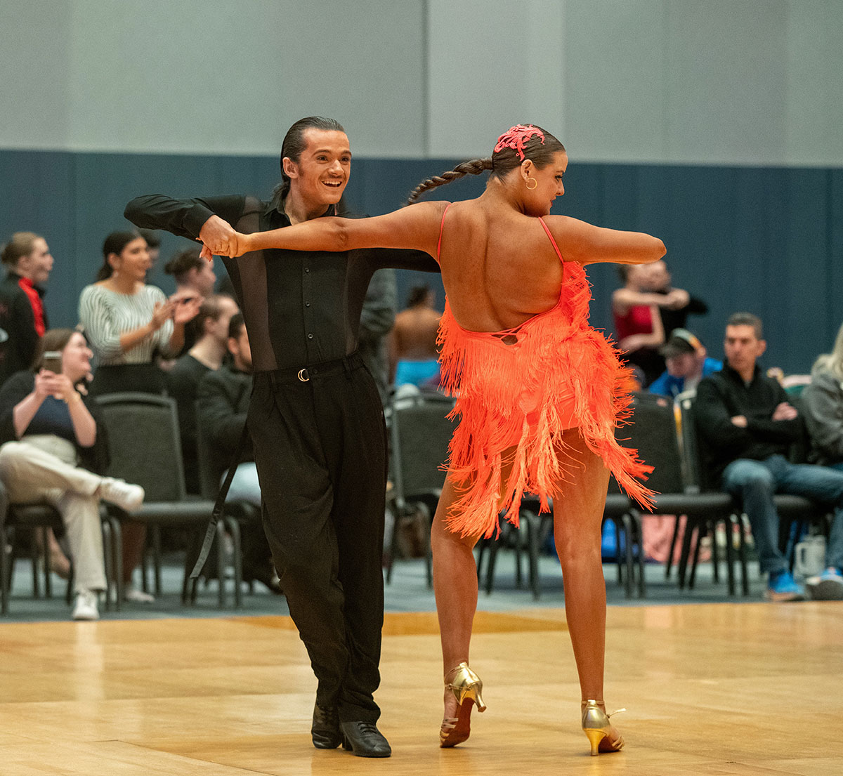 Two ballroom dance students compete. 