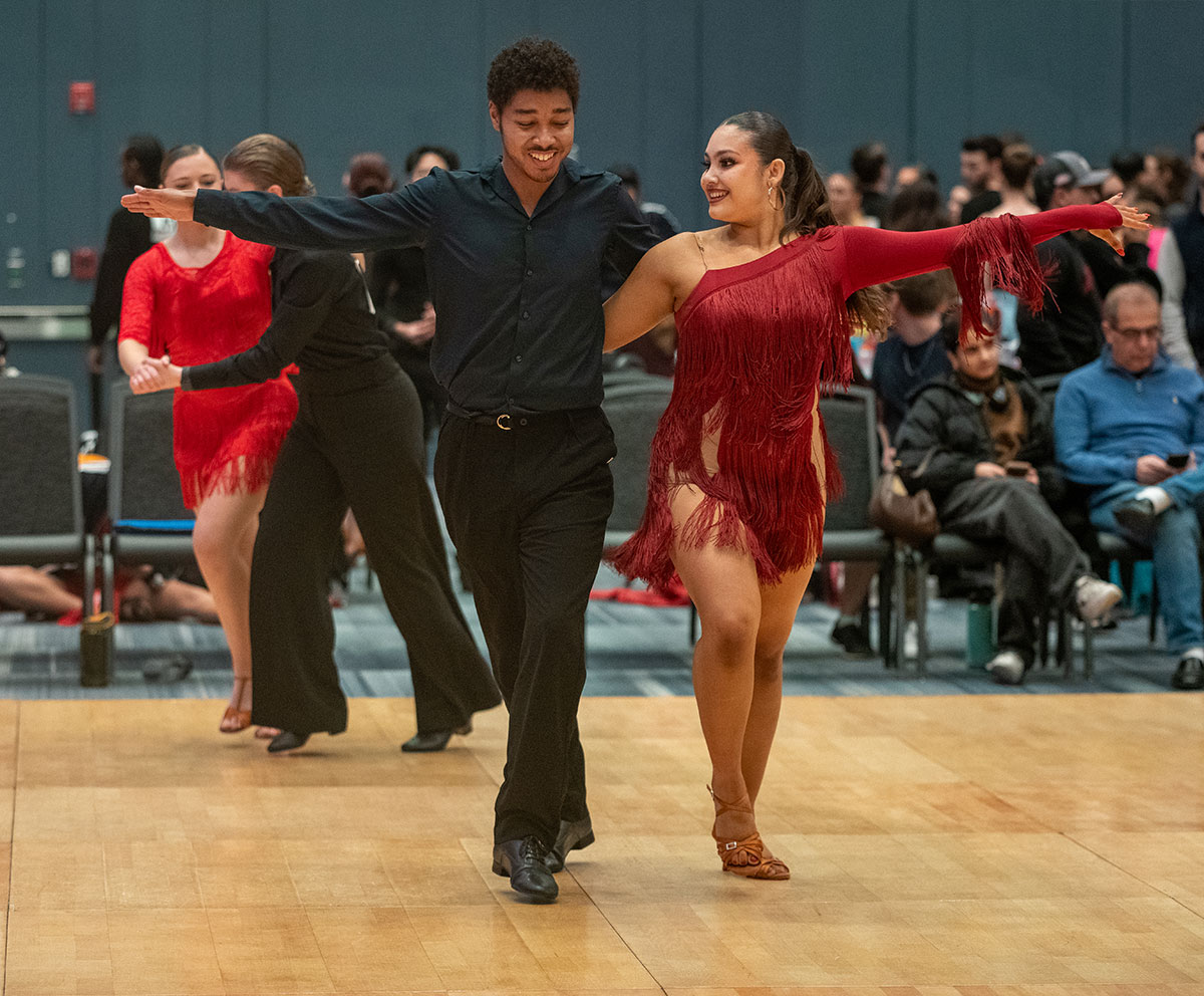 Two ballroom dance students compete. 