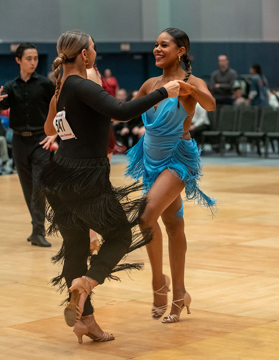 Two ballroom dance students compete. 