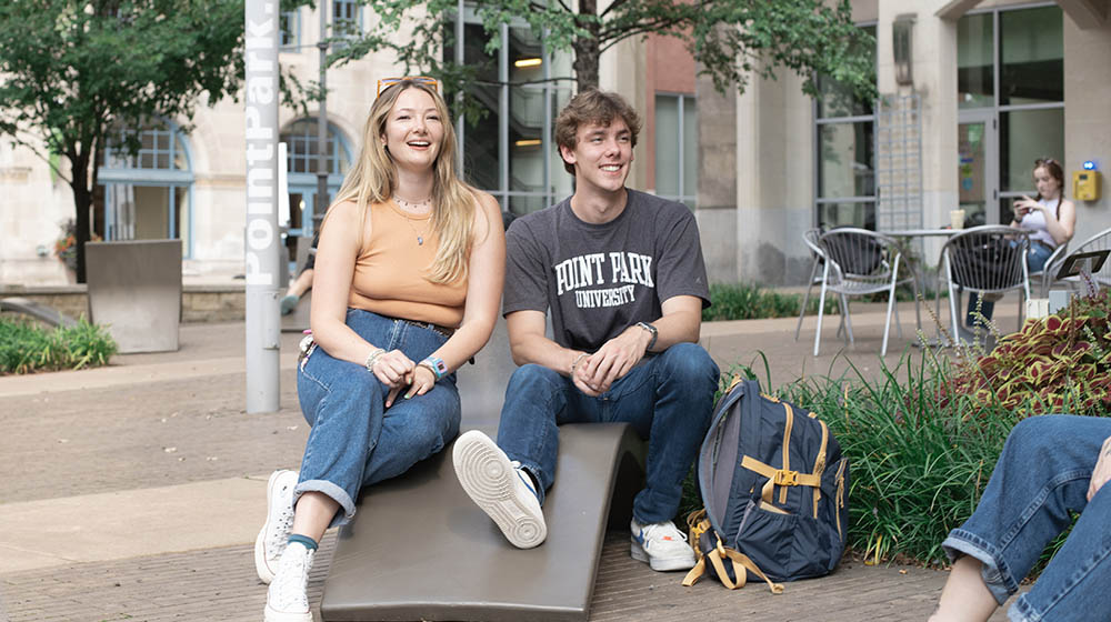 Pictured are students in Village Park on campus. 